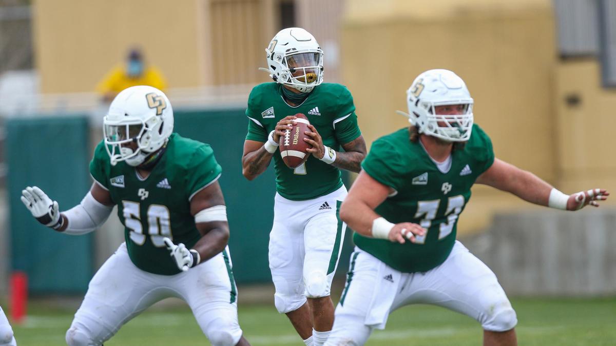 From left: D.J. Stuckey, Jalen Hamler and Nicolo DiFornzo of Cal Poly on offense. Cal Poly hosted Southern Utah in the first football game of the season. Alex G. Spanos stadium had no spectators due to coronavirus restrictions Saturday March. 13, 2021.(David Middlecamp/The Tribune (of San Luis Obispo)