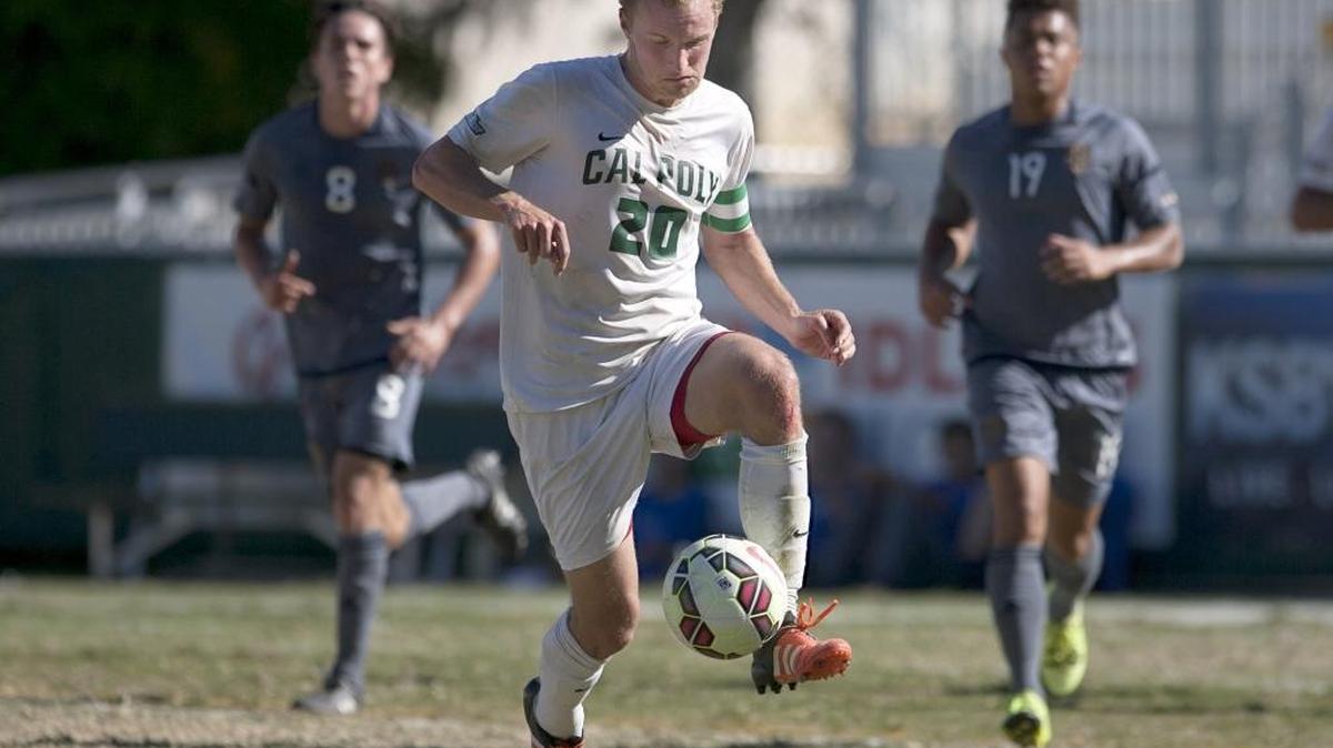 Cal Poly’s Matt Lagrassa (20) dribbles the ball ahead of UC Irvine’s Mats Bjurman (8) and Randall McDermott (19) during second-half play in the Mustangs’ 1-0 win over UC Irvine in a Big West Tournament game Saturday.