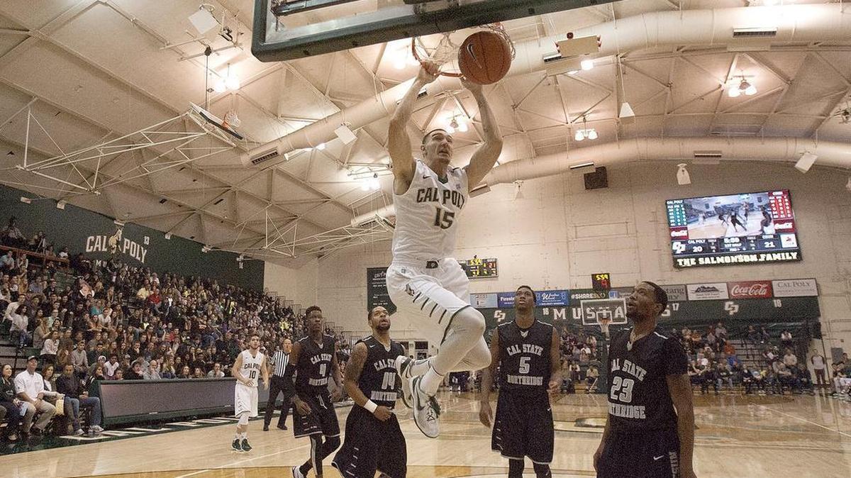 Cal Poly’s Josh Martin dunks for two of his 15 points during the Mustangs’ 75-71 overtime loss against CSUN on Saturday night inside Mott Athletics Center.