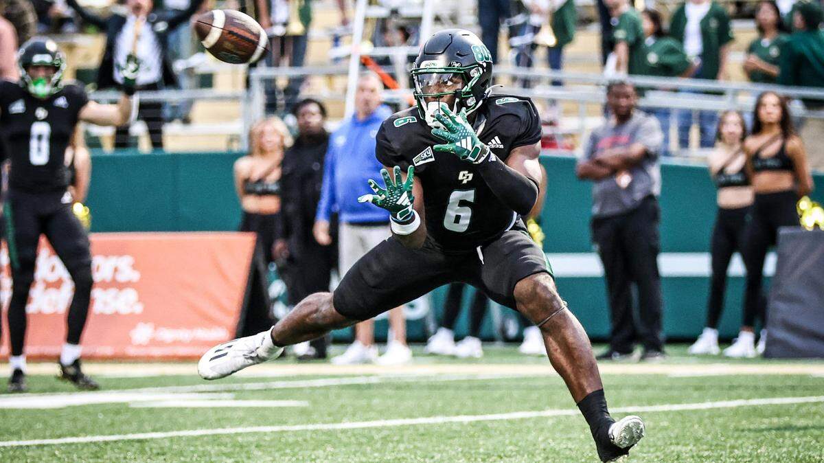 Cal Poly wide receiver Tyrece Fairly-Diyem (6) catches a touchdown pass in the second quarter. The Cal Poly football team beat Lincoln 41-20 at home on Sept. 16, 2023. 