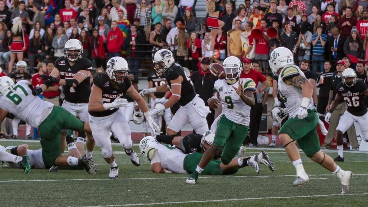Cal Poly quarterback Chris Brown pitches the ball during the Mustangs’ 54-37 loss to Southern Utah on Saturday. Brown was one of four Cal Poly players to have at least 100 yards rushing in the game.