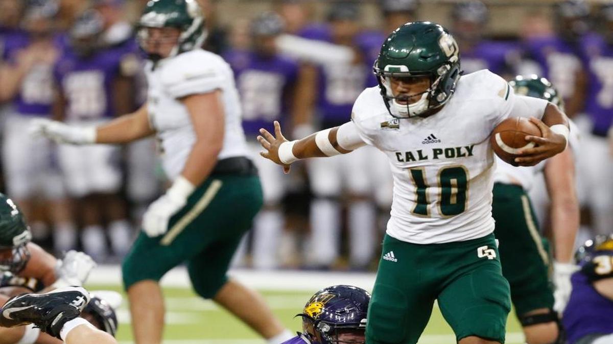 Northern Iowa’s Hezekiah Applegate, left, sacks Cal Poly quarterback Khaleel Jenkins during the second half of Saturday’s game in Cedar Falls, Iowa.