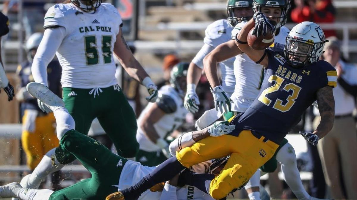 University of Northern Colorado running back Brandon Cartagena is tackled in the Bears’ 42-0 win Saturday over Cal Poly.