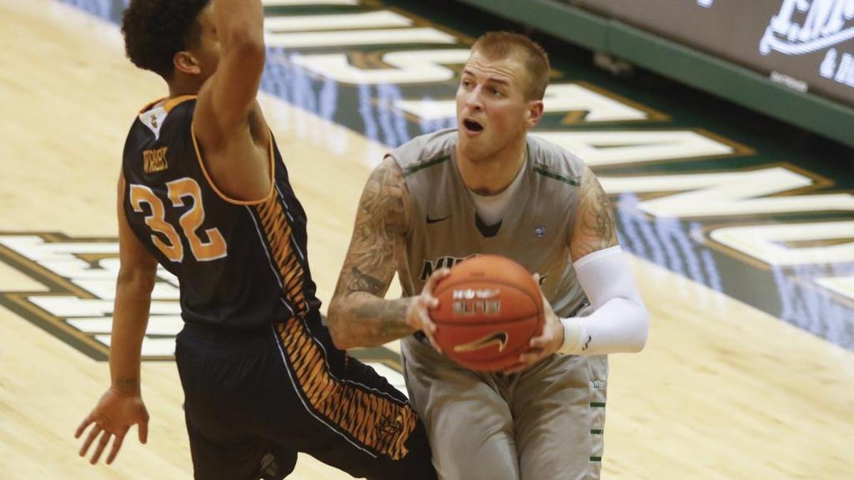 Brian Bennett made this shot against Aaron Wright late in regulation. Cal Poly hosted U.C. Irvine in a Big West Men's basketball game Feb. 3, 2016.