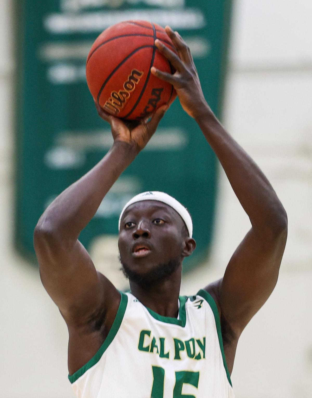 Ali Koroma shoots a three-pointer for Cal Poly in a win against UC Irvine on March 3, 2022.