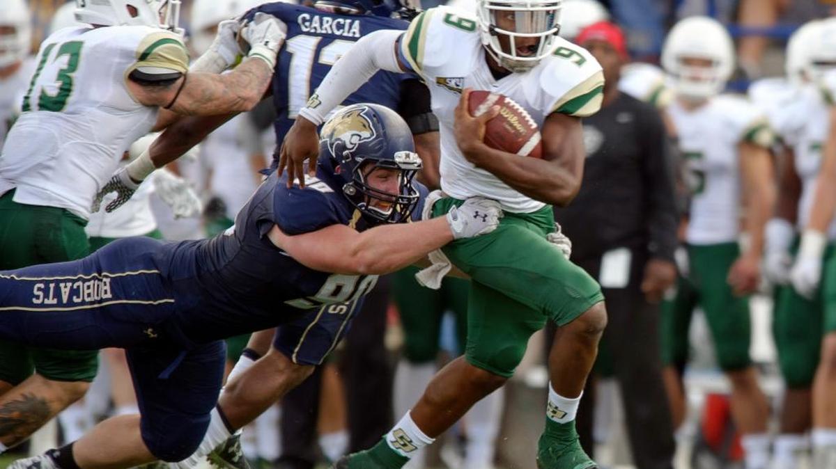 Cal Poly quarterback Chris Brown leads the Big Sky Conference in rushing this season, averaging 117 yards per game with nine touchdowns.