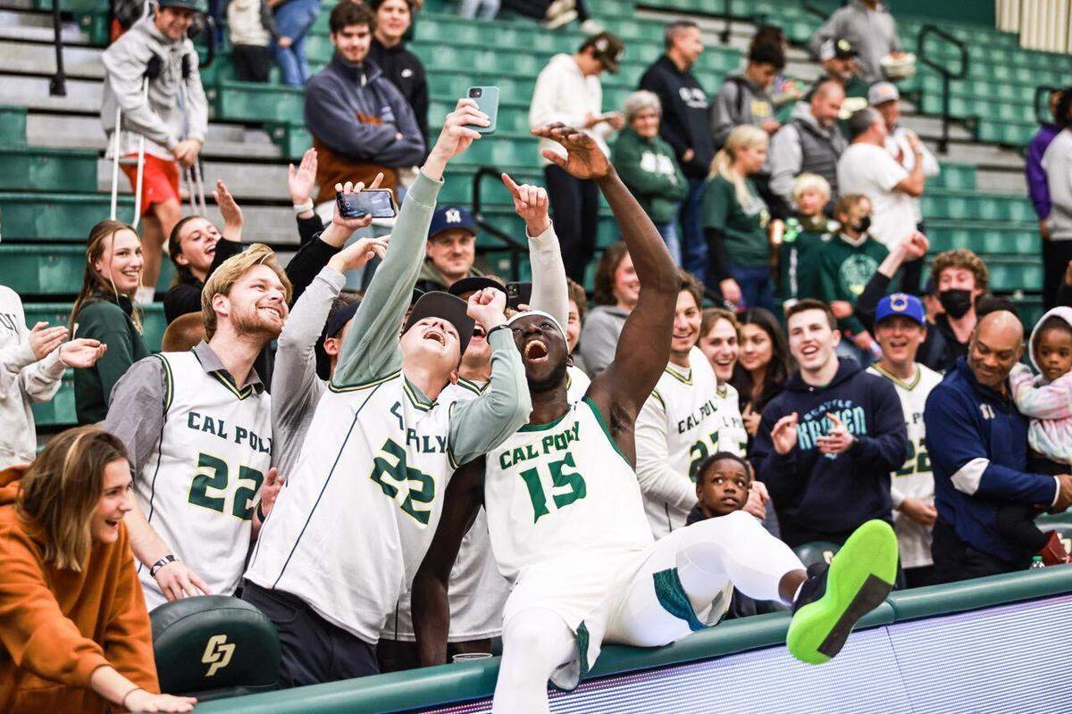 Ali Koroma celebrates with fans after beating UC Irvine on March 3, 2022.