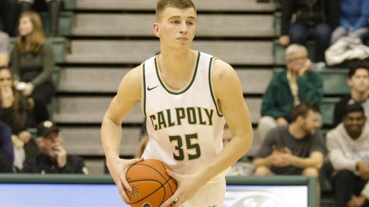 Jakub Niziol swings the ball around the perimeter. Cal Poly hosted U.C. Irvine in a men’s basketball game at Mott Gym, San Luis Obispo.