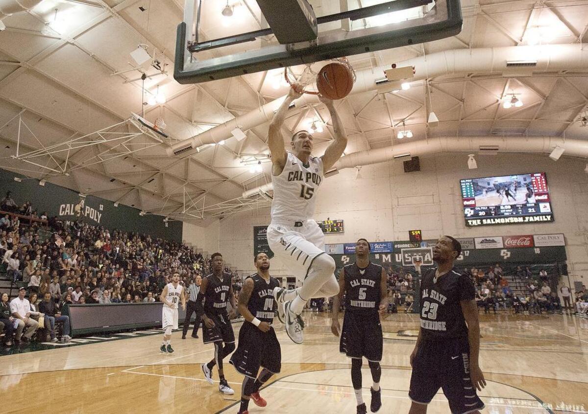 Cal Poly’s Josh Martin dunks for two of his 15 points during the Mustangs’ 75-71 overtime loss against CSUN on Saturday night inside Mott Athletics Center.