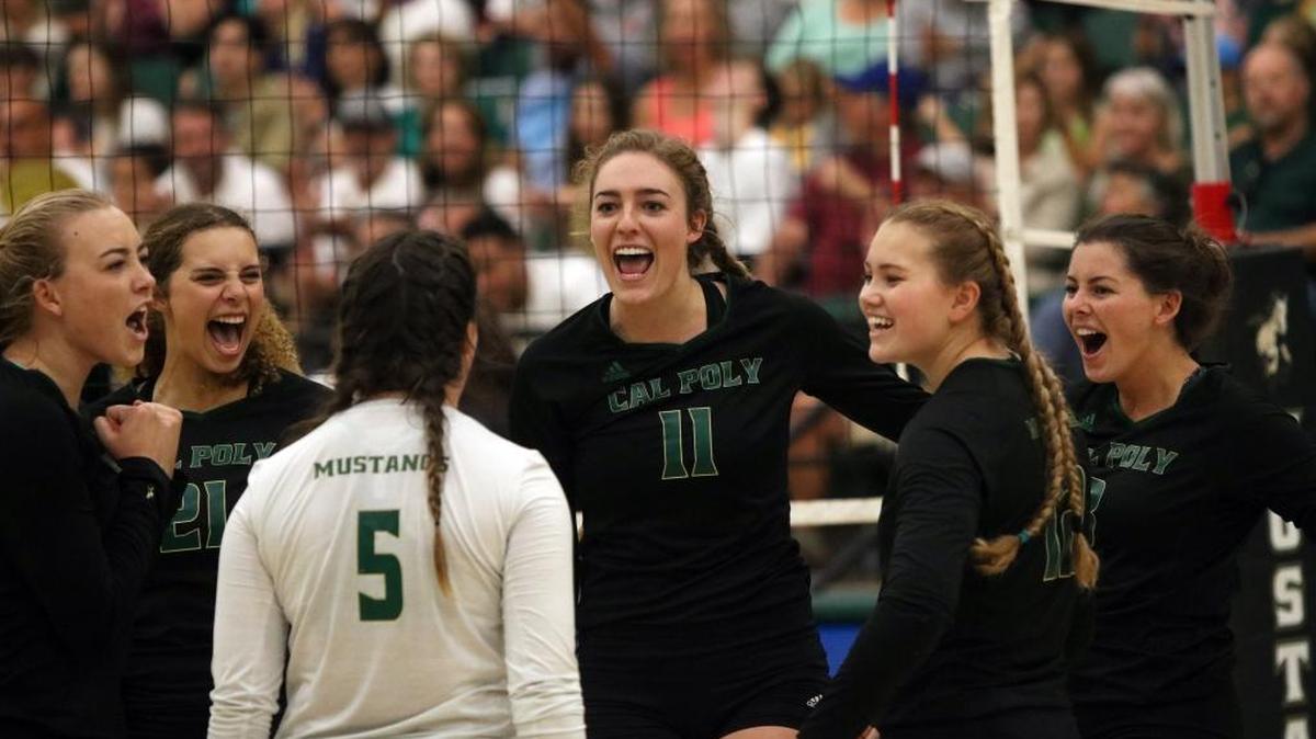 Cal Poly sophomore Torrey Van Winden (center) celebrates with her teammates during a match against UC Irvine.