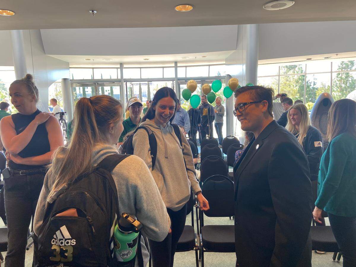 New Cal Poly women’s basketball coach Shanele Stires meets with students after a press conference on Thursday.