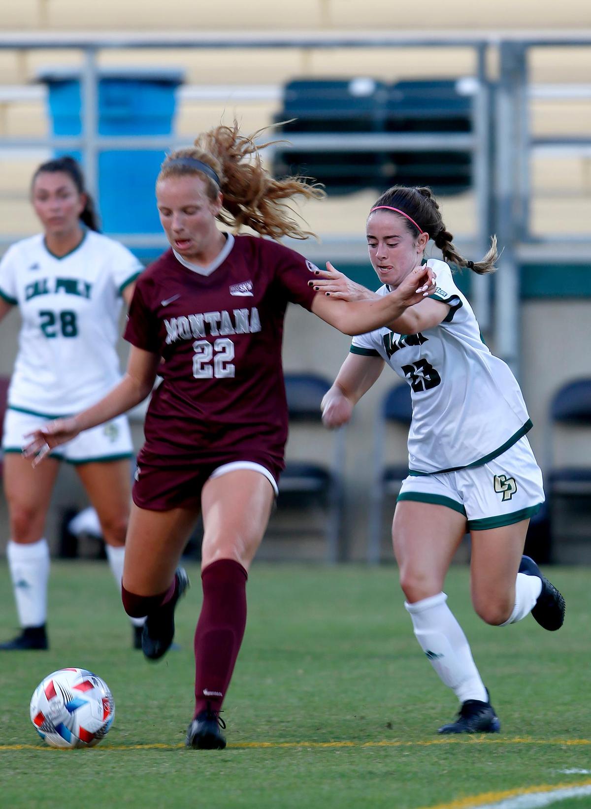 Cal Poly’s Camile LaFaix (23) applies pressure to Montana’s Molly Massman (22). The Cal Poly women’s soccer team wins the match against Montana, Thursday, August 26, at Alex G. Spanos stadium in San Luis Obispo.
