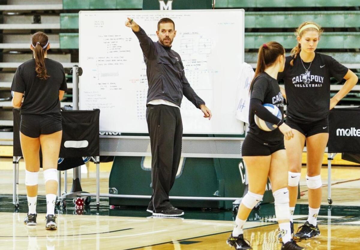 Fifth-year Cal Poly head coach Sam Crosson directs a drill during a morning practice last week inside Mott Athletics Center.