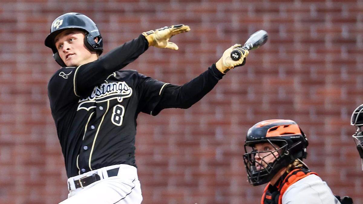 Second baseman Ryan Fenn swings at a pitch.