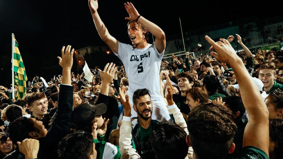 Cal Poly senior defender Nick Carroll celebrates with fans at Alex G. Spanos Stadium after the Mustangs beat UCSB 1-0 in front of a sellout crowd in their Blue-Green rivalry series opener Sunday, Sept. 30, 2018.