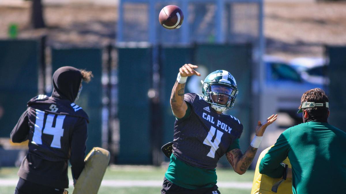 Sophomore Jalen Hamler throws a pass during a Cal Poly football practice in March 2021.