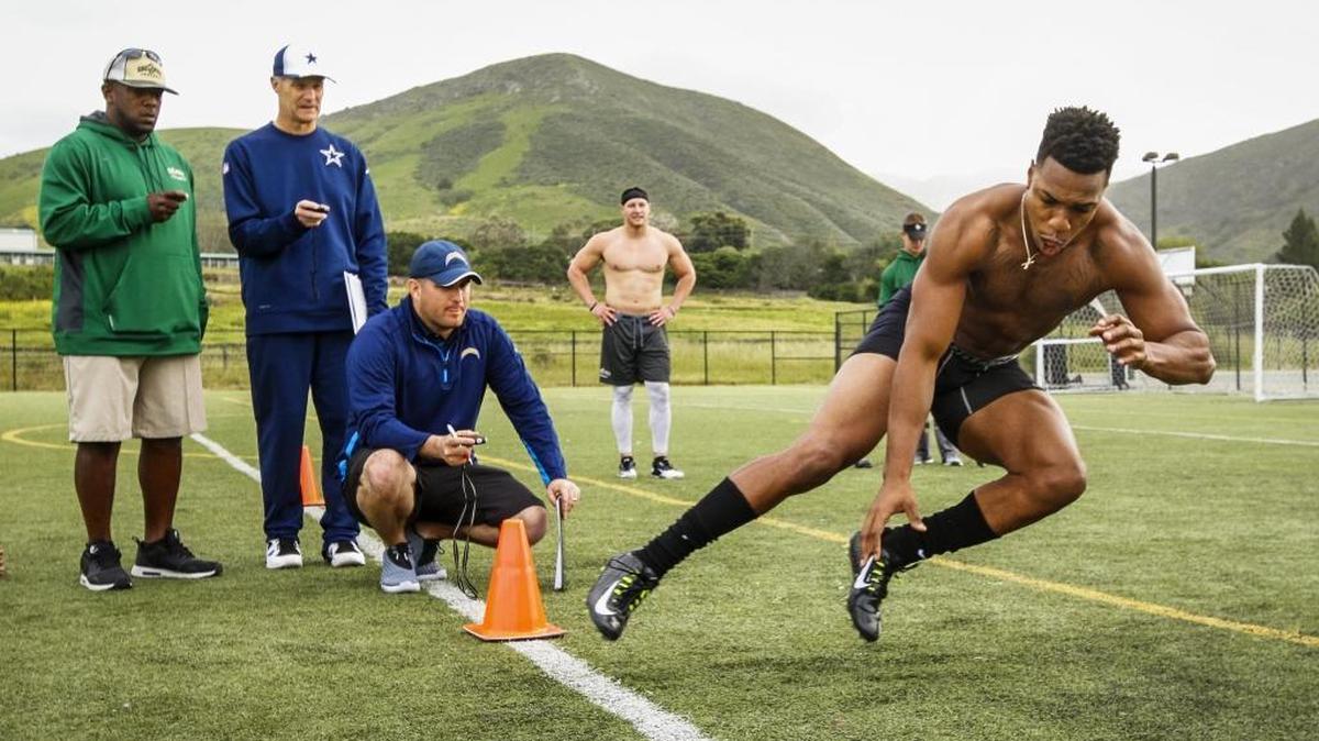 Former Cal Poly football wide receiver Jordan Hines runs through a drill in front of NFL scouts during Monday’s Pro Day at Cal Poly.