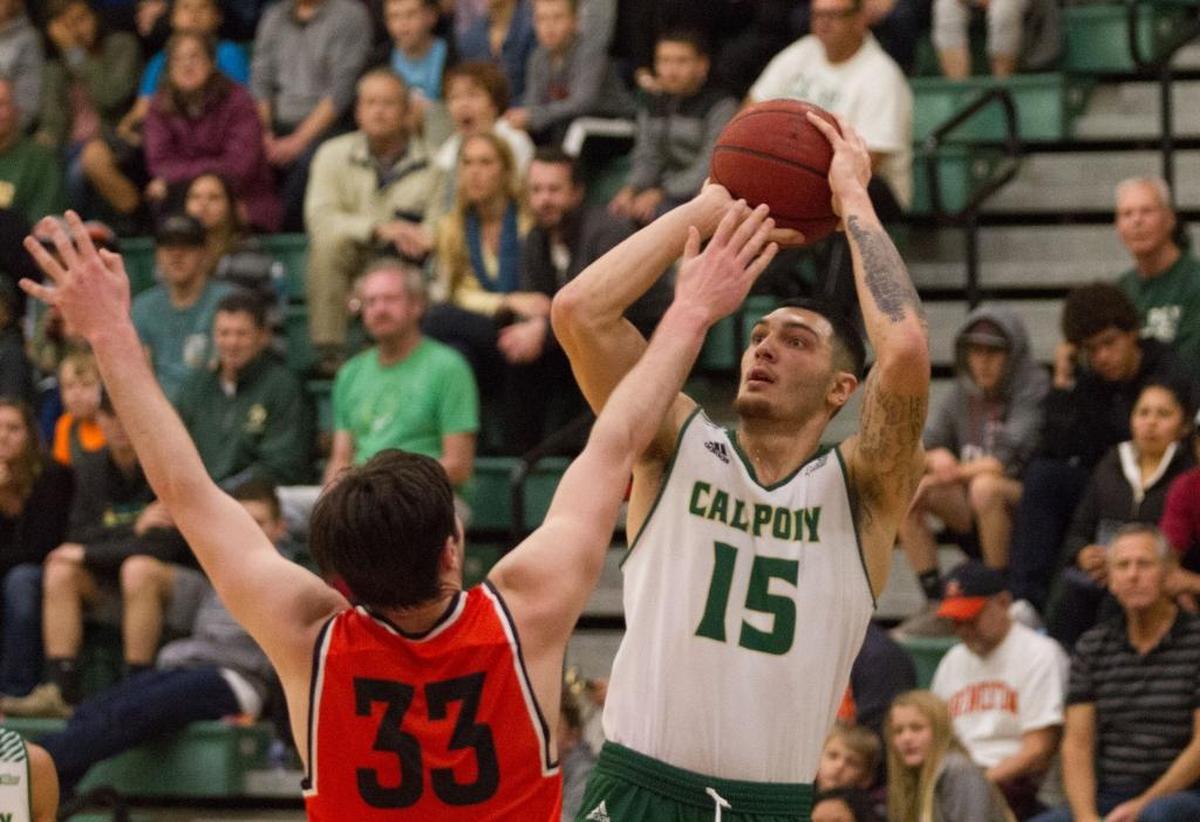 Cal Poly's Josh Martin shoots over Princeton's Sebastian Much in a nonconference game Saturday at Mott Athletic Center.