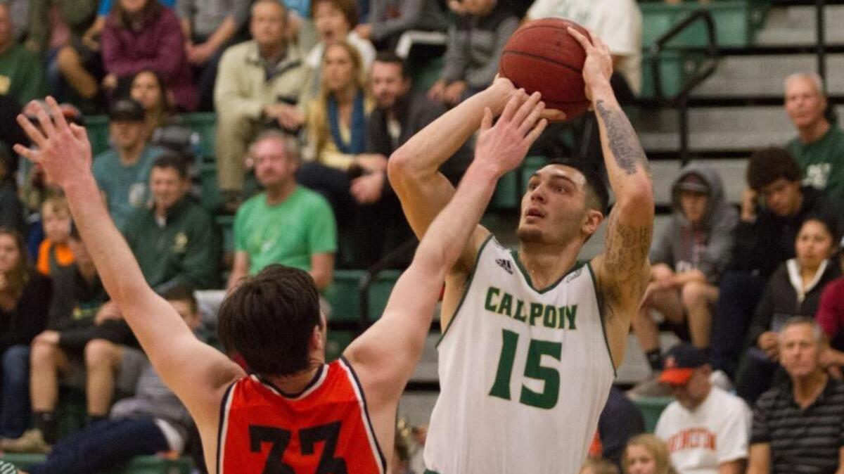 Cal Poly's Josh Martin shoots over Princeton's Sebastian Much in a nonconference game Saturday at Mott Athletic Center.