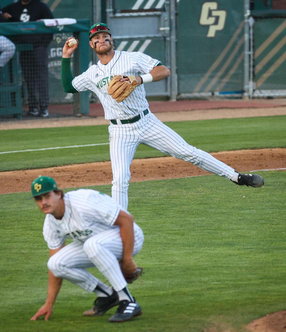 Third baseman Tate Samuelson throws over pitcher Drew Thorpe. Cal Poly lost to UCSB 7-10 in an 11 inning game April 29, 2022.