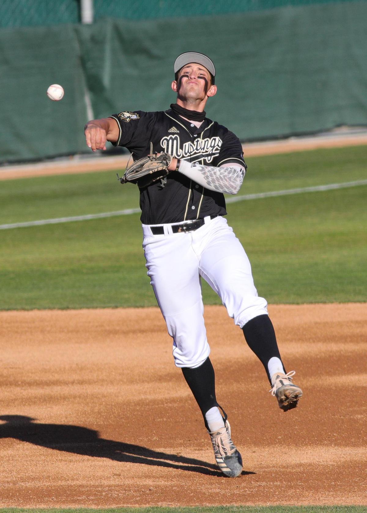 Cal Poly shortstop Brooks Lee throws out a runner. Cal Poly hosted Nevada for a four-game baseball series to open the season.