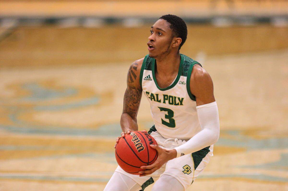 Cal Poly hosted UC Riverside for an NCAA men’s basketball game earlier this year. Colby Rogers sets up for a shot on this play.