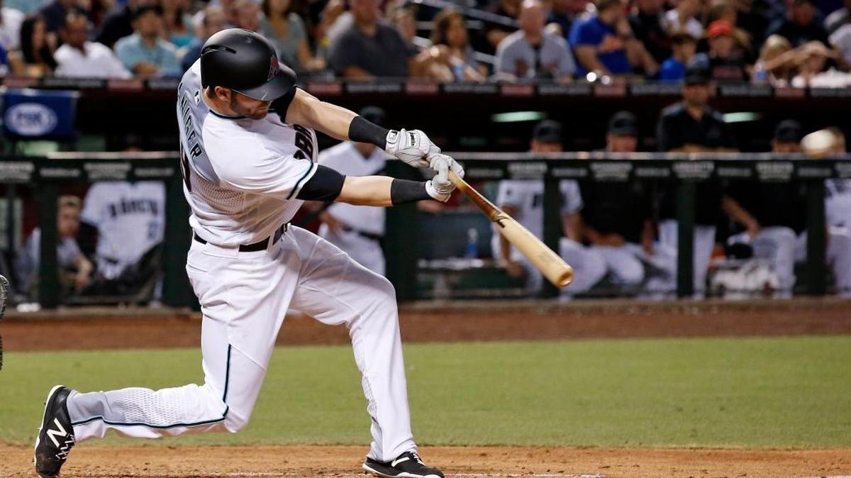 Former Cal Poly standout and current Arizona Diamondback Mitch Haniger hits a two-run triple against the New York Mets during his Major League debut in mid-August. Haniger was recalled by Arizona this week.