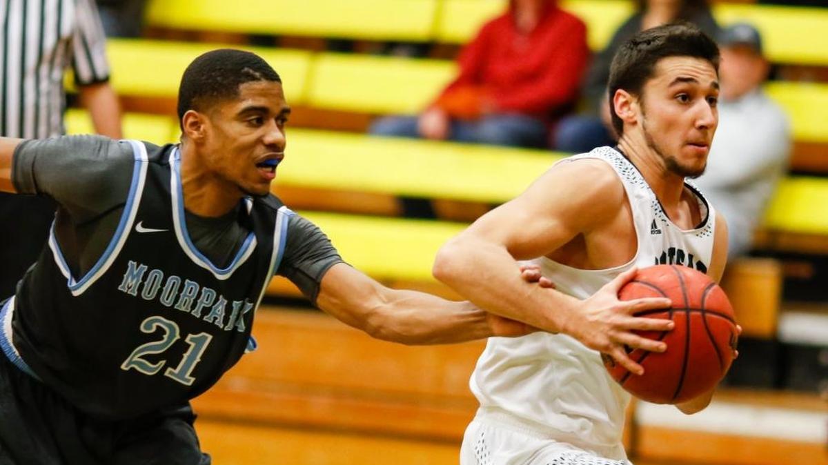 Cuesta College sophomore Karem Özel drives to the basketball during a Western State Conference game last winter. The Cougars host rival Allan Hancock at 5 p.m. Wednesday inside Cuesta Gym.