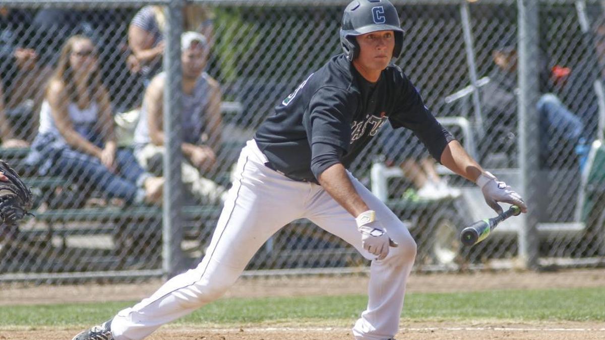 Cuesta College’s Nate Javine puts down a sacrifice bunt during the Cougars’ 9-2 win against LA Pierce on Friday. Cuesta won its first Western State Conference championship since 2013.