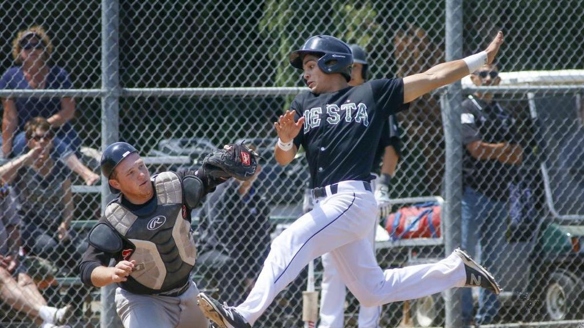 Cuesta College third baseman Josh Medina scores from third on a sacrifice fly in the first inning Friday. The Cougars defeated Chaffey 8-3 in the first game of a best-of-three series.