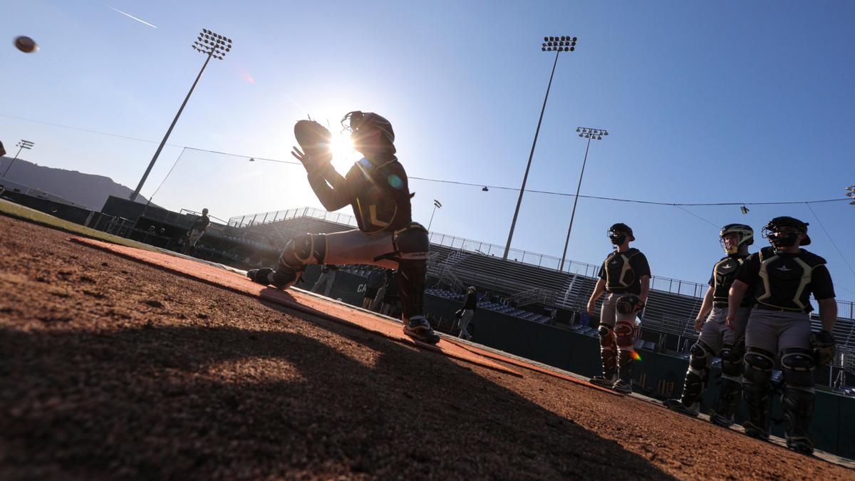 Cal Poly baseball players practice at Baggett Stadium. This photo won first place in the sports feature photo category of the 2020 California Journalism Awards Contest.