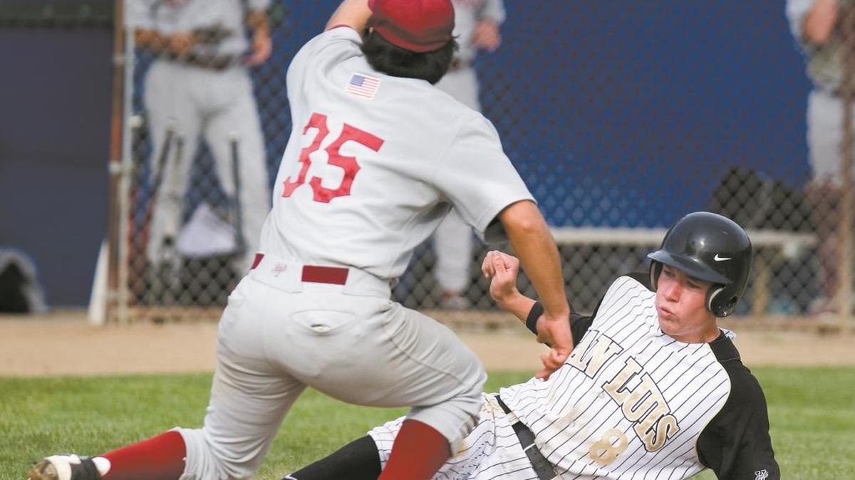 San Luis Obispo's Davey Casciola slides into home for a run in a 2012 game against Paso Robles.