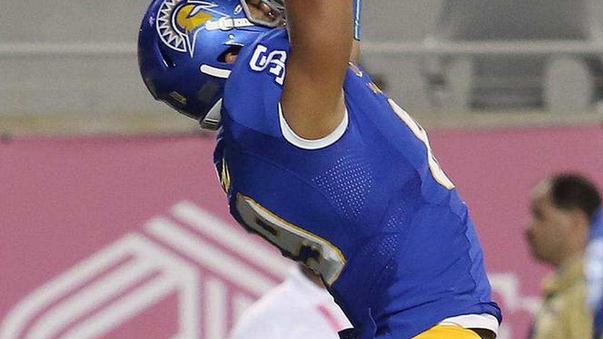 San Jose State tight end Josh Oliver, a Paso Robles High grad, hauls in a touchdown catch during the Cure Bowl on Saturday in Orlando, Fla.