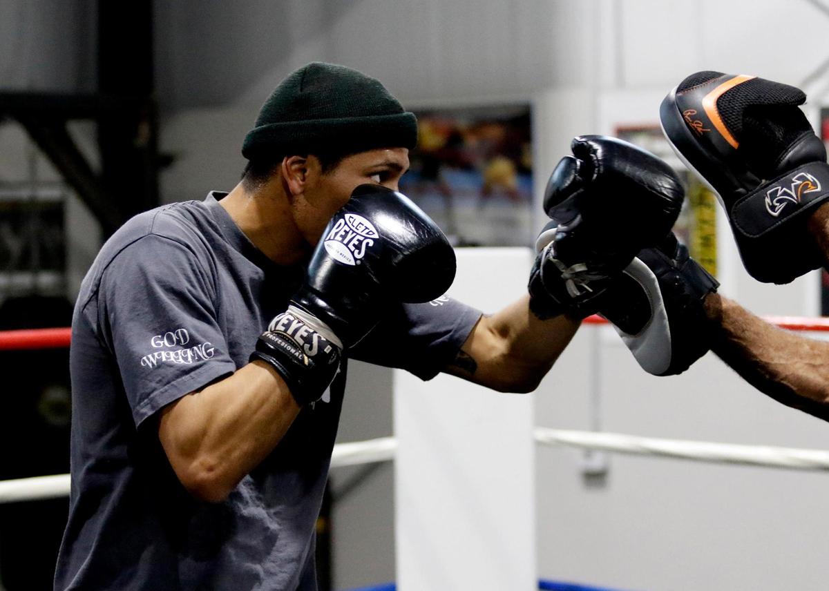 Professional boxes Bryan Martinez, a Paso Robles resident, is getting ready to fight his first match Sacramento on Jan. 21, 2022. Martinez spars with his trainer (not pictured).