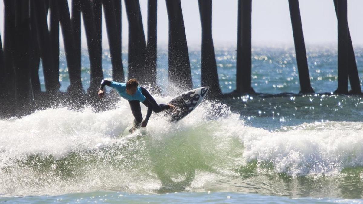 A surfer competes in the 2016 Still Frothy Surf Festival contest held at Pismo Beach.