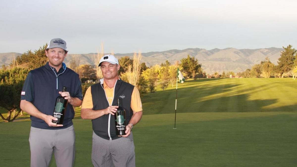 Bryce Molder, left, and Jim Strickland were the winners of the 20th annual Straight Down Fall Classic golf tournament.