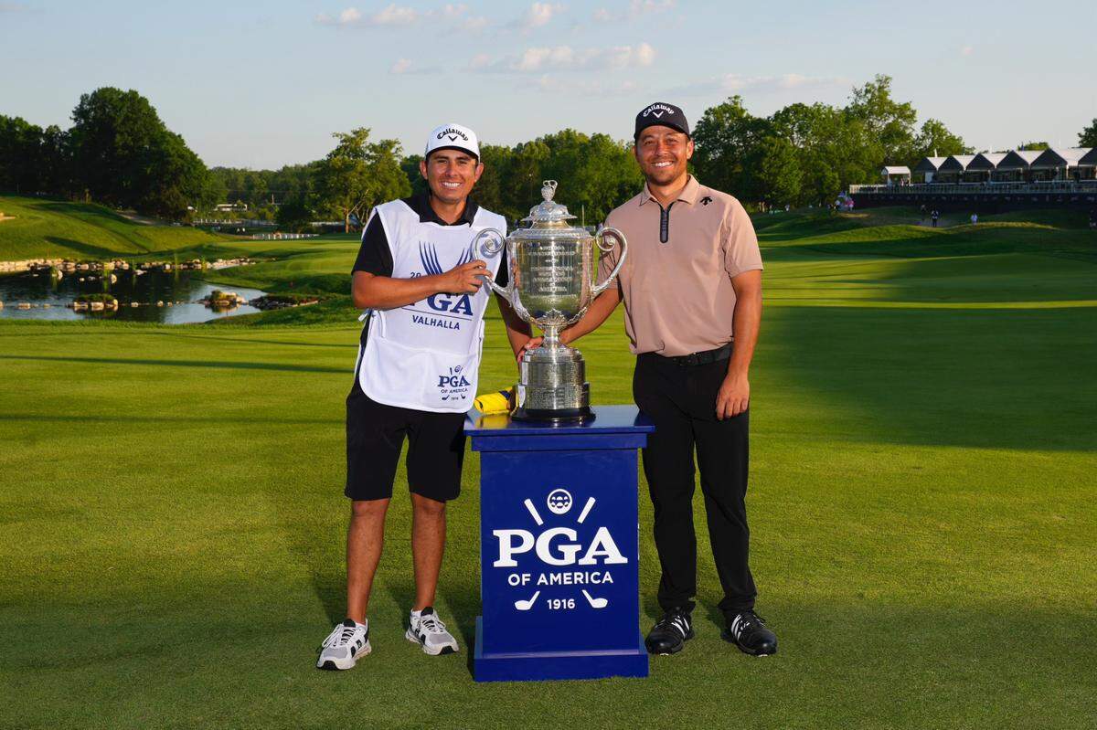 Atascadero High School grad Austin Kaiser, left, and Xander Schauffele celebrate Schauffele’s PGA Championship win on May 19, 2024, at Valhalla Golf Club in Kentucky. Kaiser now caddies for Schauffele.