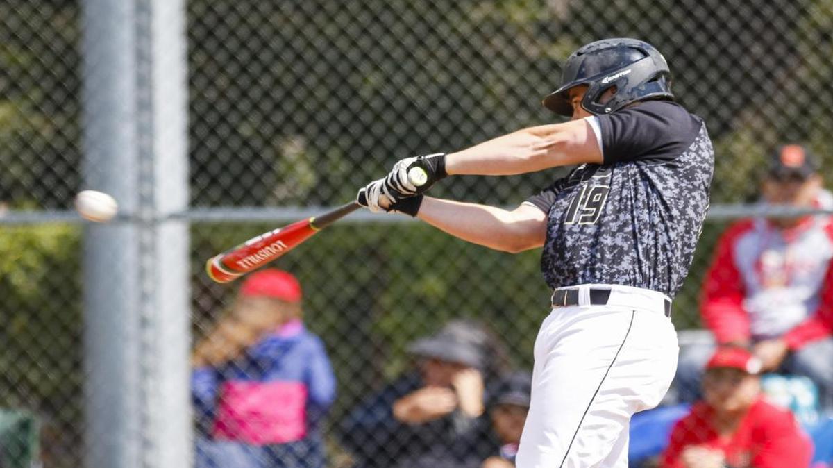 San Luis Obispo High School’s Jeremy Jess hits during the Tigers’ playoff win over Segerstrom Friday.