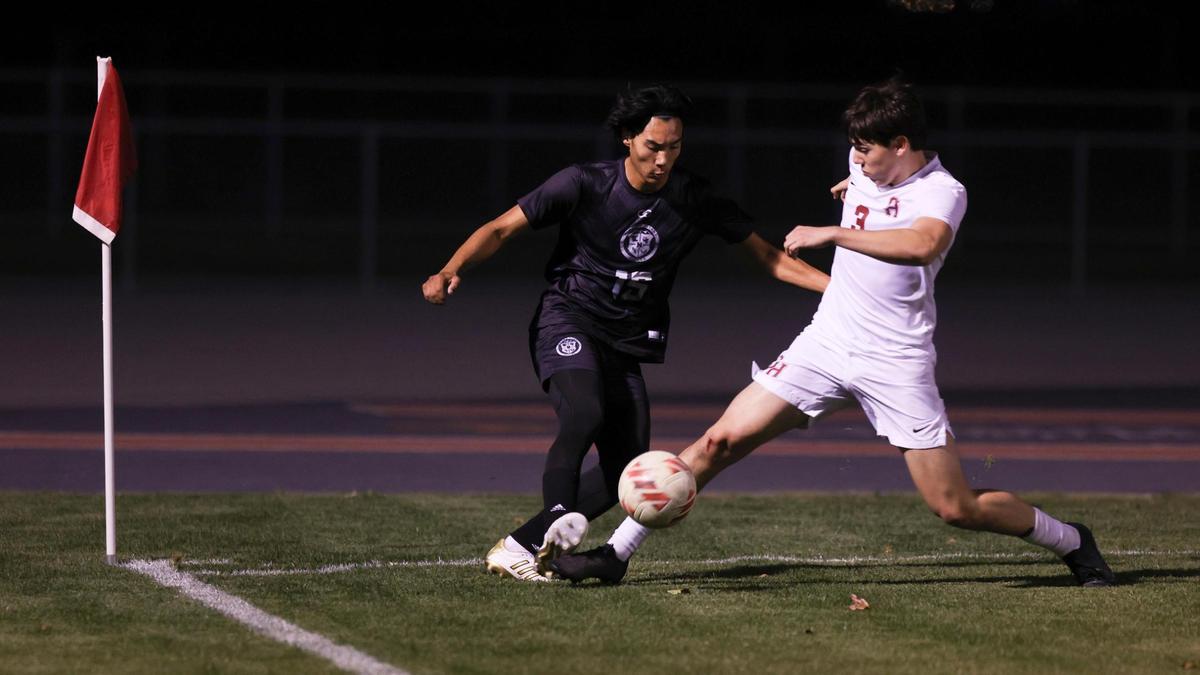 Casey Lemus passes out of the corner around Hector Gonzalez. Nipomo lost 2-0 to Granite Hills High School of Porterville in CIF-Central Section boys Division 5 soccer final match on Feb. 26, 2025.