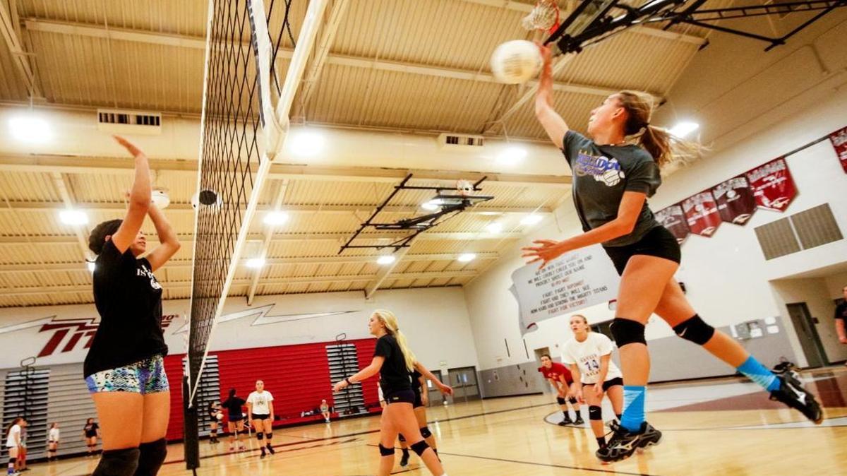 The Nipomo High School girls volleyball team plays in 2016. Players on the team faced racial slurs and sexual harrassment from Templeton High School fans during a Sept. 28, 2021, game.