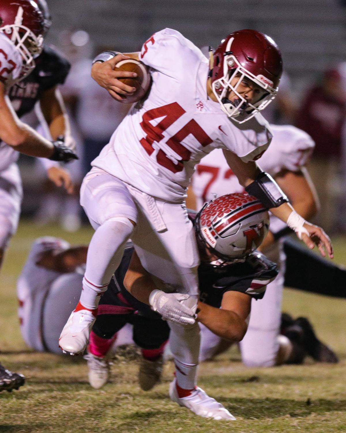 Devin Mowreader runs the ball during Paso Robles 19-12 win over Nipomo on Oct. 8, 2021. Mowreader will play football at La Verne.