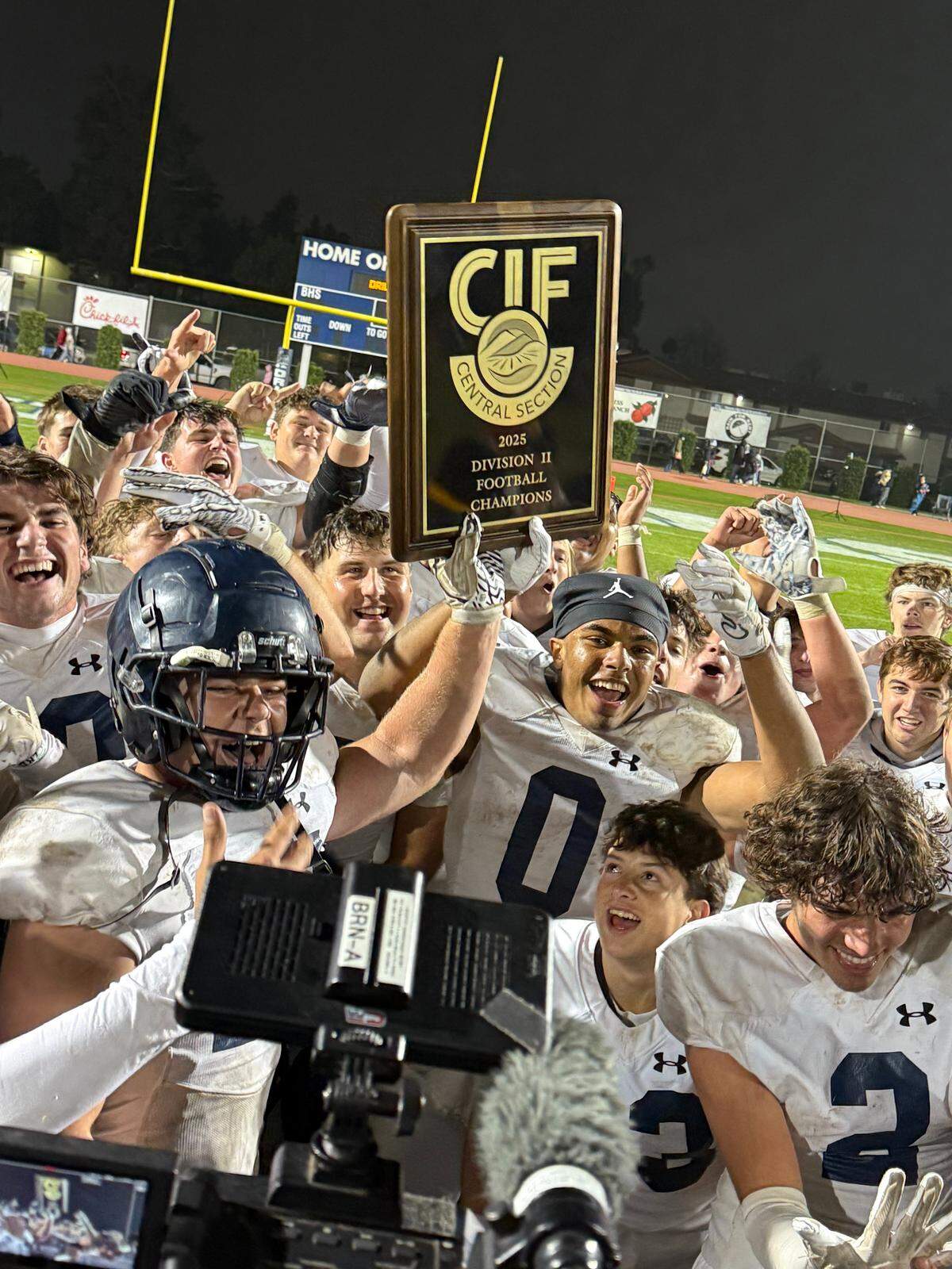 Arroyo Grande celebrates its CIF title win over Bakersfield, a 23-20 overtime victory, on Friday, Nov. 28, 2025.