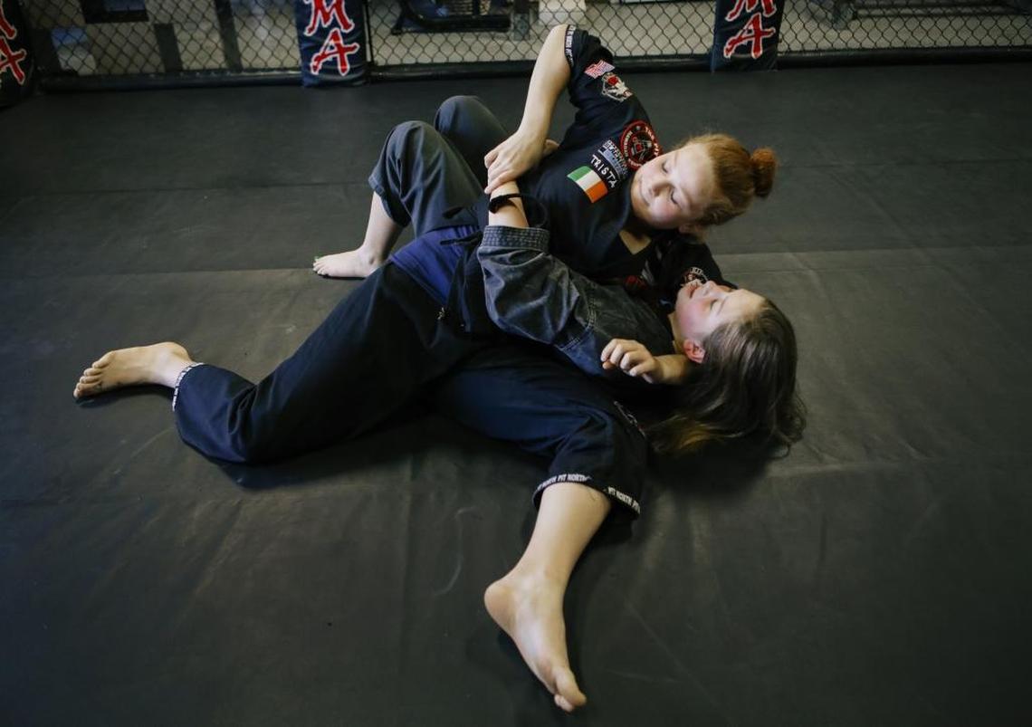 Atascadero High School freshman Trista Stordahl, 14, an up-and-coming MMA fighter, trains with her friend Sami Williams at Pit North.