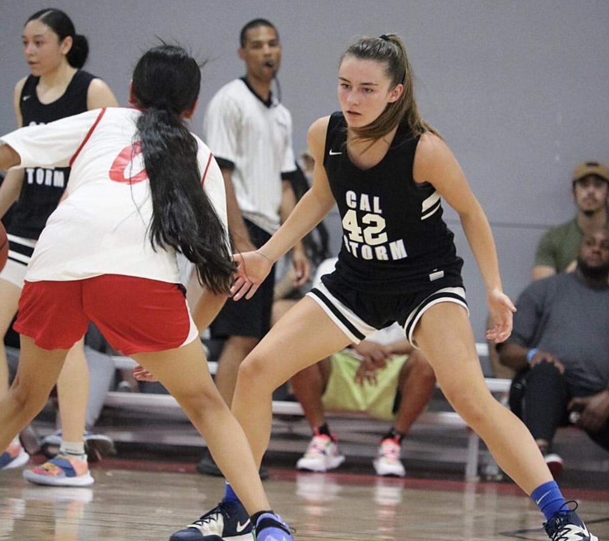 Emma Boehm, who plays at Mission Prep, plays defense here on her club team. Boehm will move on to play basketball at George Fox University in Oregon next year.