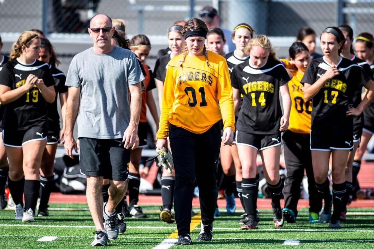 SLO High principal and former head girls soccer coach Leslie O’Connor walks with his team after South Hills beat SLO High in 2016 to win the CIF-State Championship on March 12, 2016, in Covina.
