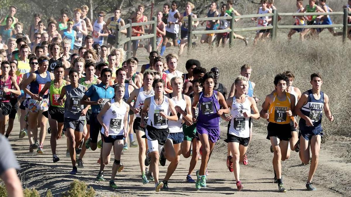 San Luis Obispo’s Callum Bolger (seventh from the right) competes in the Foot Locker Cross Country West Region Championships on Saturday at Mt. San Antonio College in Walnut. He placed fifth to qualify for next weekend’s national championships in San Diego.