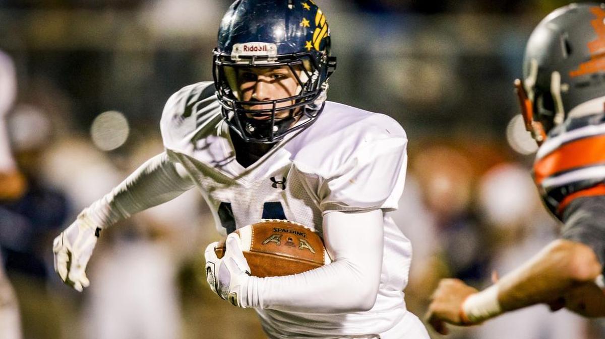 Arroyo Grande High’s Matt Sill runs past an Atascadero defender in a game Oct. 30.
