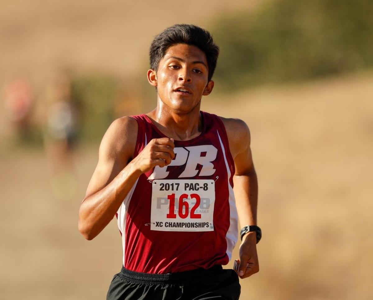 Paso Robles High School junior Pablo Cortes competes at the PAC 8 midseason cross country meet at the Fairbanks Course.