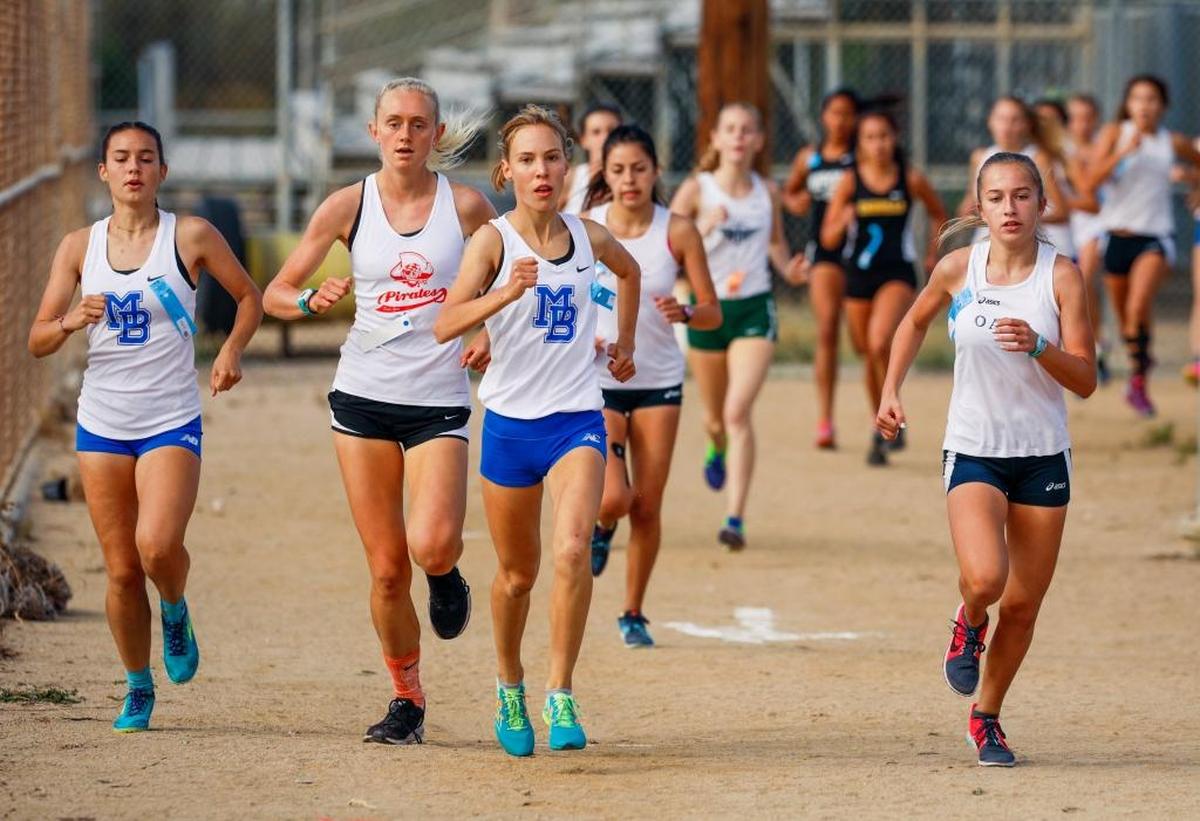 Morro Bay junior Audrey McClish leads the pack as runners compete in the Los Padres League Finals at Morro Bay.