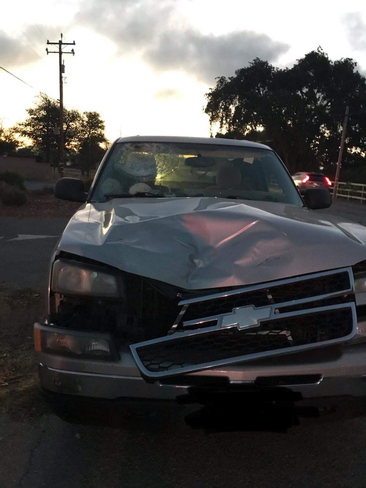 A photo taken after the crash shows the crumpled front end of the truck that hit Walker Craven while he was riding his bike in Templeton in 2021.
